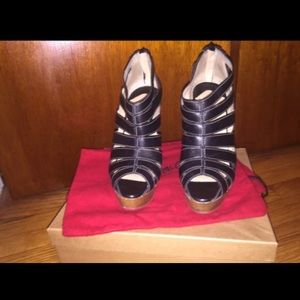 Authentic Christian Louboutin wooden platforms
